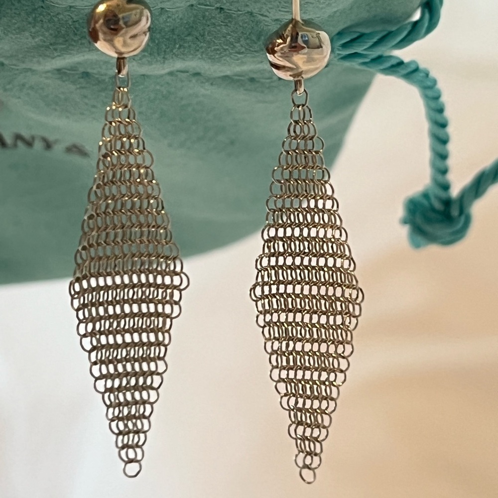 TIFFANY & CO. Elsa Peretti Sterling silver mesh earrings.